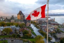 Canadian flag representing Canada's economic challenges and ongoing trade tensions with the United States